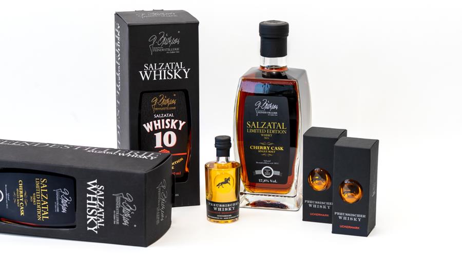 Verpakkingsoplossing in premium zwart recyclagepapier voor whiskymerken
